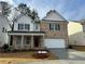 Two-story brick home with white accents and a covered porch at 793 River Gardens Se Dr, Atlanta, GA 30354