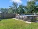 Large above ground pool in backyard, great for summer fun at 10 Toscanno Dr, Covington, GA 30014