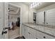 Bathroom with granite countertop, white cabinets, and a sink at 2570 Reynolds Sw Rd, Atlanta, GA 30331