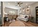 Home office featuring wood floors, a desk, and neutral color palette at 2570 Reynolds Sw Rd, Atlanta, GA 30331