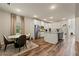 Modern kitchen with white cabinets, stainless steel appliances, and an island at 2570 Reynolds Sw Rd, Atlanta, GA 30331