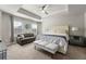 Luxurious main bedroom with a comfy seating area and high ceiling at 2570 Reynolds Sw Rd, Atlanta, GA 30331