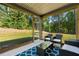 Relaxing screened porch with wooded views at 2570 Reynolds Sw Rd, Atlanta, GA 30331