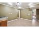 Bright basement kitchen with appliances and access to other rooms at 2656 Old Norcross Rd, Tucker, GA 30084