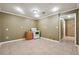 Basement kitchen with white stove and tile floor at 2656 Old Norcross Rd, Tucker, GA 30084