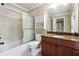 Bathroom with granite countertop and shower/tub combo at 2656 Old Norcross Rd, Tucker, GA 30084