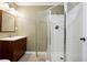 Clean bathroom with vanity and shower stall at 2656 Old Norcross Rd, Tucker, GA 30084