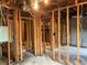 Unfinished basement with framed walls and exposed wiring at 6354 Shannon Pkwy # 6D, Union City, GA 30291