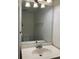 Small bathroom with single sink vanity and a mirror at 6354 Shannon Pkwy # 6D, Union City, GA 30291