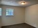 Bright bedroom featuring a window and carpet flooring at 6354 Shannon Pkwy # 6D, Union City, GA 30291