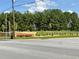 Community entrance with landscaping and signage at 6354 Shannon Pkwy # 6D, Union City, GA 30291