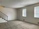 Spacious living room with neutral carpeting and ample natural light at 6354 Shannon Pkwy # 6D, Union City, GA 30291