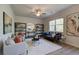 Living room boasts hardwood floors, a neutral color palette, and ample natural light at 746 River Gardens Se Dr, Atlanta, GA 30354