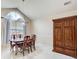 Bright dining room with table, chairs, and large window at 990 Avalon Dr, Lawrenceville, GA 30044