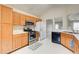 Kitchen with stainless steel appliances and wood cabinets at 990 Avalon Dr, Lawrenceville, GA 30044