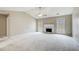 Spacious living room with a fireplace and vaulted ceilings at 990 Avalon Dr, Lawrenceville, GA 30044