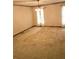 Large bedroom with ceiling fan and neutral colored carpeting at 105 Pine Valley Rd, Hiram, GA 30141