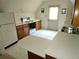 Kitchen with wood cabinets and exterior door at 105 Pine Valley Rd, Hiram, GA 30141