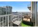 Spacious balcony with city views and seating at 855 Peachtree Ne St # 2911, Atlanta, GA 30308