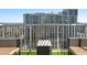 Private balcony with city views and artificial turf at 855 Peachtree Ne St # 2911, Atlanta, GA 30308