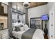 Small bedroom with built-in gray cabinets and a queen bed at 855 Peachtree Ne St # 2911, Atlanta, GA 30308