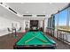 Well-equipped game room featuring a pool table at 855 Peachtree Ne St # 2911, Atlanta, GA 30308