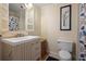 Charming bathroom with a pedestal sink and decorative accents at 114 Delta Ct, Sharpsburg, GA 30277