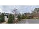 Street view of homes in a quiet, tree-lined community at 2540 Village Park Dr, Cumming, GA 30041