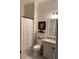 Clean bathroom with white vanity and shiplap walls at 2540 Village Park Dr, Cumming, GA 30041