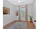 Bright bedroom with hardwood floors, neutral walls, and a window with natural light at 2540 Village Park Dr, Cumming, GA 30041