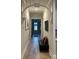 Elegant hallway with hardwood floors and arched entryway at 2540 Village Park Dr, Cumming, GA 30041