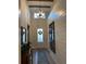 Spacious entryway with shiplap walls and a rustic mirror at 2540 Village Park Dr, Cumming, GA 30041