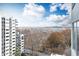 High-rise building with treetop and city views at 275 13Th Ne St # 1106, Atlanta, GA 30309