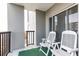 Private balcony with city views and outdoor seating at 275 13Th Ne St # 1106, Atlanta, GA 30309