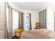 Bright bedroom with balcony access and hardwood floors at 275 13Th Ne St # 1106, Atlanta, GA 30309