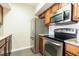 Kitchen boasts stainless steel appliances and wood cabinets at 275 13Th Ne St # 1106, Atlanta, GA 30309