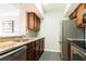 Kitchen with granite countertops, stainless steel appliances, and wood cabinets at 275 13Th Ne St # 1106, Atlanta, GA 30309