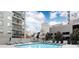 Inviting community pool surrounded by modern lounge chairs at 275 13Th Ne St # 1106, Atlanta, GA 30309