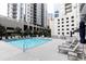 Refreshing community pool with ample lounge chairs at 275 13Th Ne St # 1106, Atlanta, GA 30309