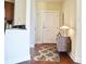 Bright entryway with a rug and console table at 325 E Paces Ferry Ne Rd # 806, Atlanta, GA 30305