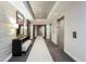 Modern hallway with elevator access and seating at 325 E Paces Ferry Ne Rd # 806, Atlanta, GA 30305