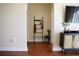 Short hallway with a ladder towel rack and hardwood floors at 325 E Paces Ferry Ne Rd # 806, Atlanta, GA 30305