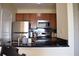 Modern kitchen with stainless steel appliances at 325 E Paces Ferry Ne Rd # 806, Atlanta, GA 30305