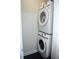 Stackable washer and dryer in a small laundry closet at 325 E Paces Ferry Ne Rd # 806, Atlanta, GA 30305