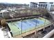 Elevated tennis court with surrounding cityscape views at 325 E Paces Ferry Ne Rd # 806, Atlanta, GA 30305