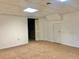 Unfinished basement with carpet and a door at 5078 Hubert Dr, Powder Springs, GA 30127