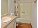 Bathroom with tub, sink, and neutral decor at 5078 Hubert Dr, Powder Springs, GA 30127