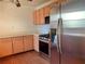 Kitchen with stainless steel appliances and wood cabinets at 5078 Hubert Dr, Powder Springs, GA 30127