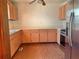 Galley kitchen with stainless steel appliances at 5078 Hubert Dr, Powder Springs, GA 30127