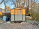 Metal storage shed in backyard, offering extra storage at 5078 Hubert Dr, Powder Springs, GA 30127